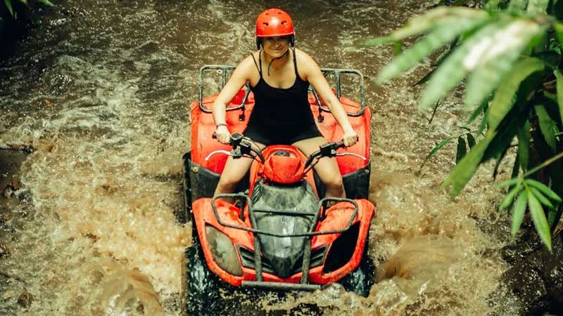 Ubud ATV Quad Bike through river Jungle waterfall rice fields